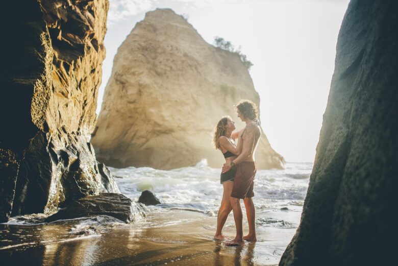 Couple walking the Pacific beach at Canoa, Manabí